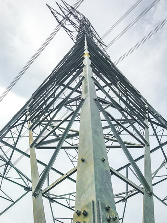 High power pylons and natural green with clear skies.の写真素材