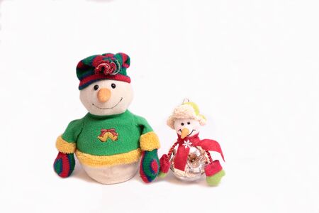 Two friends snowman with gifts の写真素材