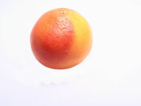 Ripe orange isolated on white backgroundの写真素材