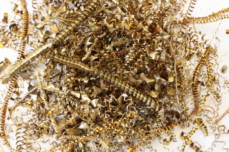 Brass waste from the lathe の写真素材