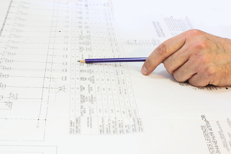 Electrical engineer parsed in the wiring diagram of construction of the object の写真素材