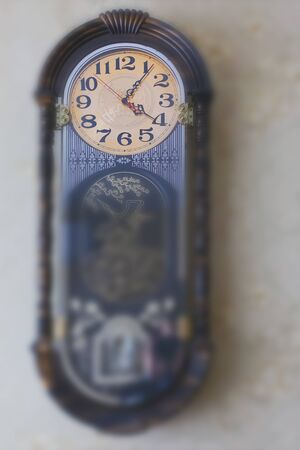 Old wall clock with musical fight in working condition.の写真素材