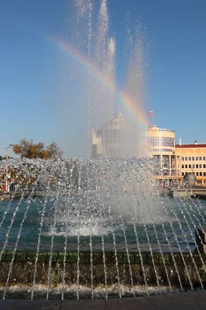 The advent of multi-color rainbow in the clear spray water jets.の写真素材