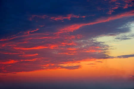 Blazing sunset clouds over the Black Sea. Russia, Krasnodar region.の写真素材