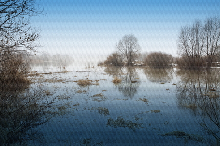 A warm fog of a spring evening in the suburbs.の写真素材