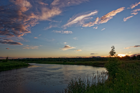 Sunset over the River in July.の写真素材