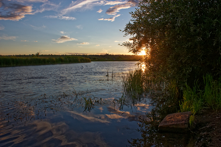 Sunset over the River in July.の写真素材