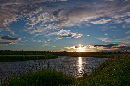 Sunset over the River in July.の写真素材