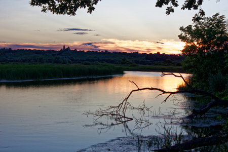 Sunset over the River in July.の写真素材
