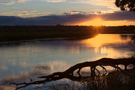Beautiful sunset over the river.の写真素材