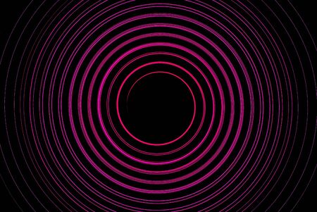 Circle dynamic bright pink cool round in darkの写真素材
