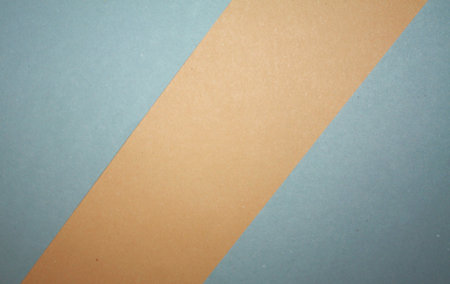 Flat design photograpgy of two colors tone papers backgroundの写真素材