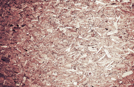 Abstract pressed sawdust plywood chip board texture backgroundの写真素材