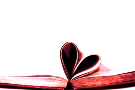 Abstract open book with heart romantic background, love or education concept.の写真素材