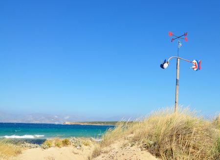 Santa Maria beach with windbreak anemometer on Paros island の写真素材