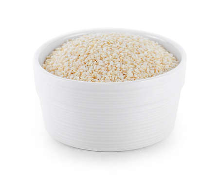 white Sesame Seeds in bowl on white backgroundの写真素材