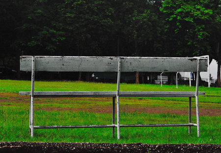 Football field and old wooden chair