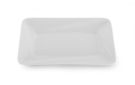 empty white plate on white backgroundの写真素材