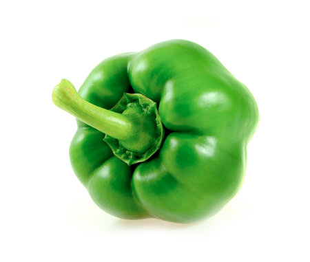 green bell peppers isolated on white backgroundの写真素材