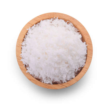 Grated Coconut in bowl isolated on white backgroundの写真素材