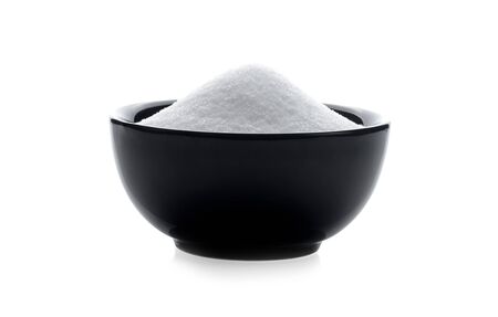 Bowl of sugar isolated on white backgroundの写真素材