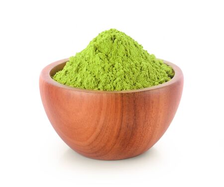 powdered matcha green tea in bowl, isolated on white backgroundの写真素材