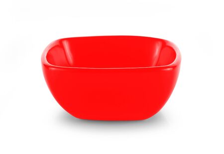 empty red bowl on white backgroundの写真素材