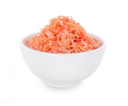 Dried small shrimp in white bowl isolated on white background.の写真素材