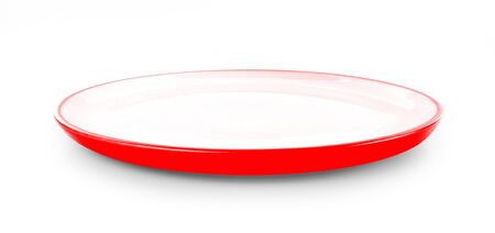 empty red plate isolated on white backgroundの写真素材