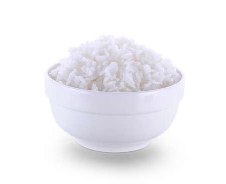 rice in bowl isolated on white backgroundの写真素材