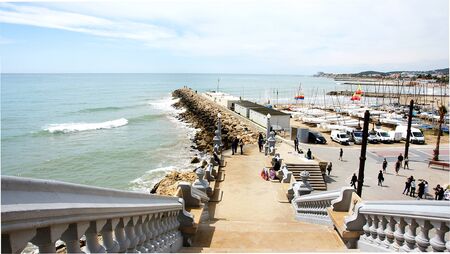 Panoramic of the sea and Sitges s beach from the perron of Sant Bartomeu s Church, Barcelonaのeditorial素材