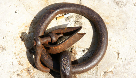 shackle nailed to the groundの写真素材