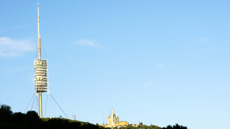 Collserola tower with Temple of the sacred heart, Barcelonaのeditorial素材