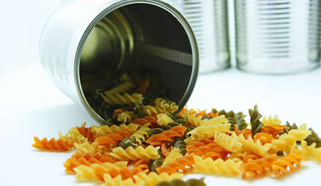 Spirals of pasta out  tin of aluminiumの写真素材