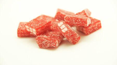 Heap of candies on white bottomの写真素材