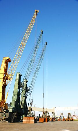 Three cranes in the port of Barcelonaのeditorial素材