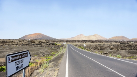 landscape with lonely road, Lanzarote, Canary Islandsの写真素材