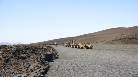 Tourists walking on camels, Lanzarote, Canary Islandsのeditorial素材