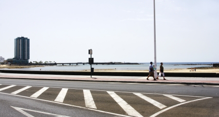 Overview of a street with the sea in the background in Arrecife, Lanzarote, Canary Islandsのeditorial素材