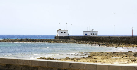 Overlooking from promenade of the beach of Arrecife in Lanzarote, Canary Islands