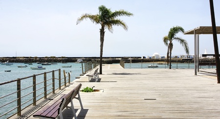 Protection fence broken seafront promenade in Arrecife, Lanzarote, Canary Islandsの写真素材