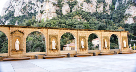 Arcade with sculptures at the Monastery of Montserrat, Barcelonaの写真素材