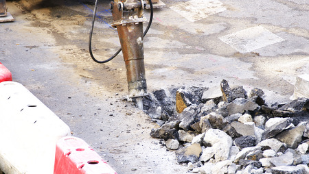 Detail of a drill by lifting the pavementの写真素材