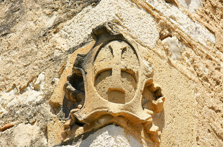 Shield engraved on a wall
