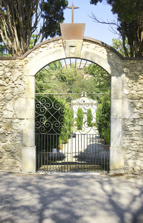 Entrance gate to the cemetery of Besalu, Girona, Catalonia, Spainの写真素材