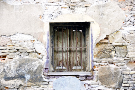 Window in an old facade for backgrounds and textures