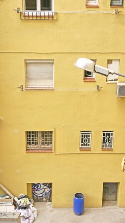 Freshly painted yellow facade, Barcelona, Catalunya, Spainの写真素材