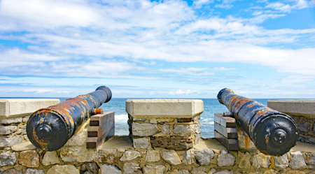 Cannons in the port of Comillas, Santander, Cantabria, Spainの写真素材