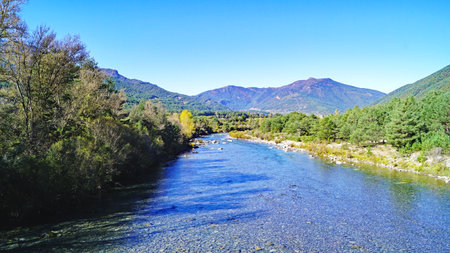 Ara river as it passes through Broto in the province of Huesca, Aragon, Spain, Europeの写真素材