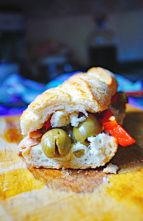Sandwich with prickly pear, olives and red peppers for backgroundの写真素材